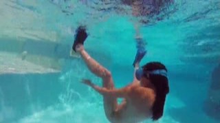 hot raven brunette bimbo candy swims underwater