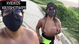 Hotwife Kriss Displays Luscious Boobs While Strolling On Beach