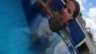 lady mature goddess doing that sensuality game in the pool