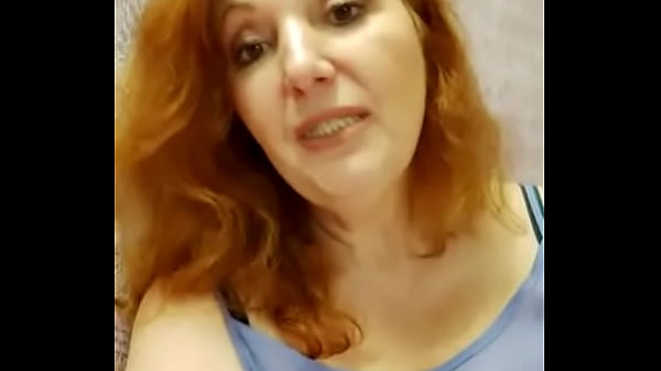 Redhead Lady Teases in Blue Blouse