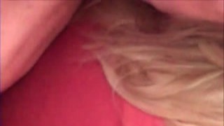 stuffed grandma in red in bed