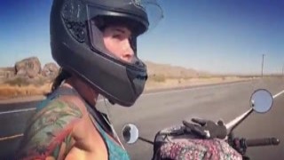 felicity feline motorcycle babe riding aprilia in bra