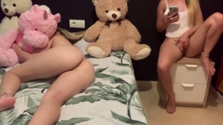 young pussy touches her vagina with her stepsis next to her